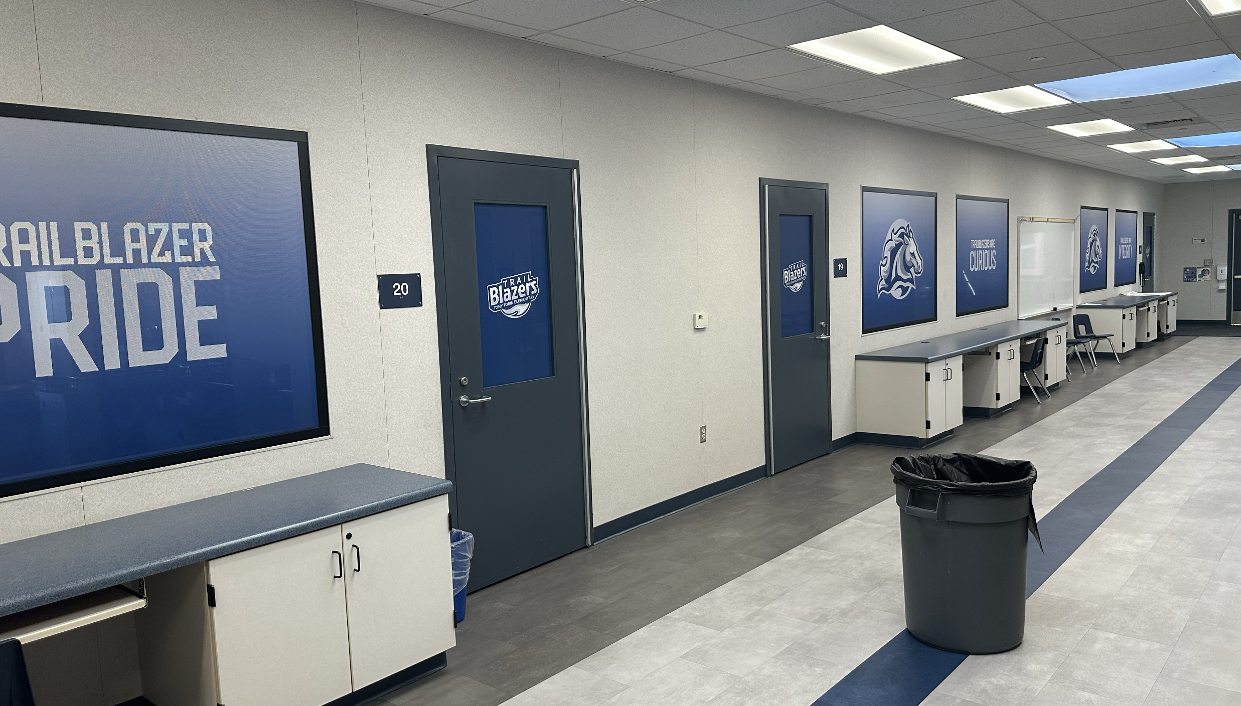 Trailblazer Pride complete campus rebrand hallway environmental graphics